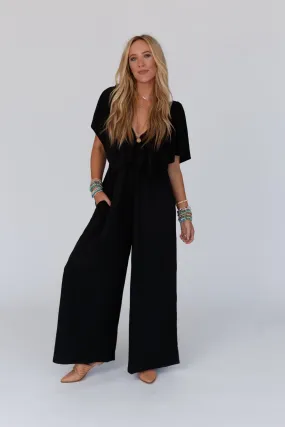 The Nest On Repeat Open Back Ruffle Jumpsuit - Black