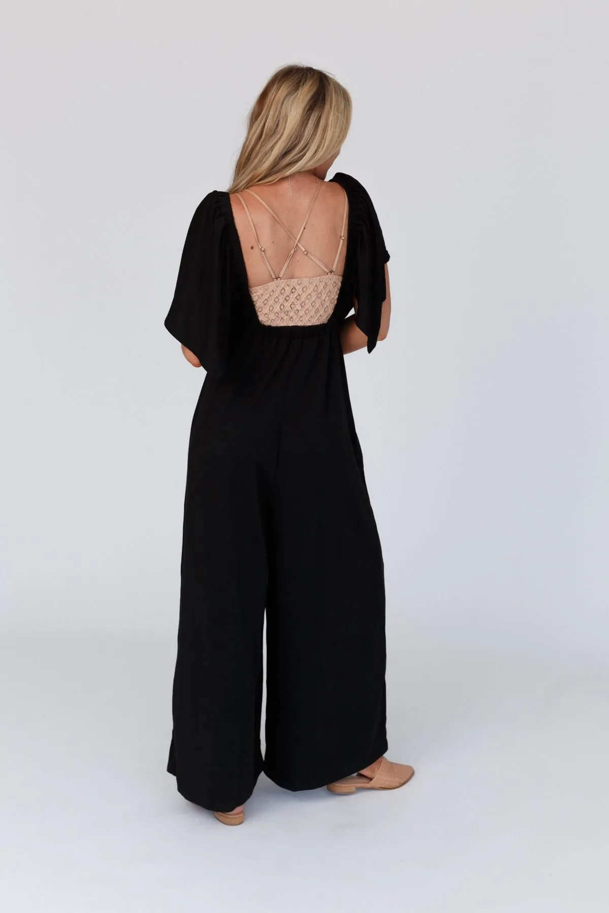 The Nest On Repeat Open Back Ruffle Jumpsuit - Black