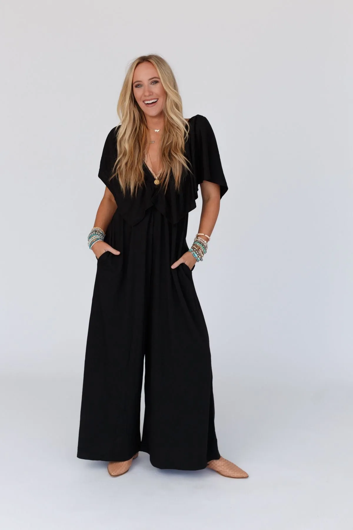 The Nest On Repeat Open Back Ruffle Jumpsuit - Black