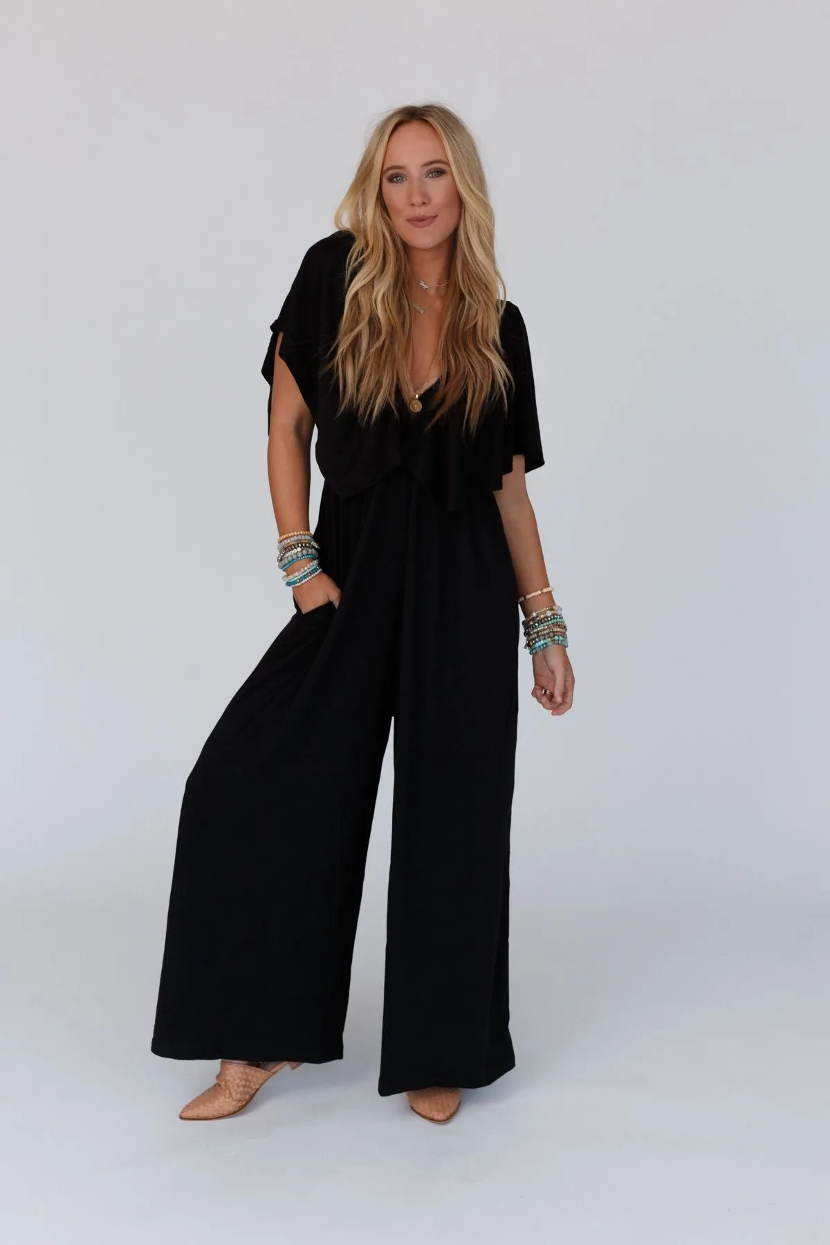 The Nest On Repeat Open Back Ruffle Jumpsuit - Black